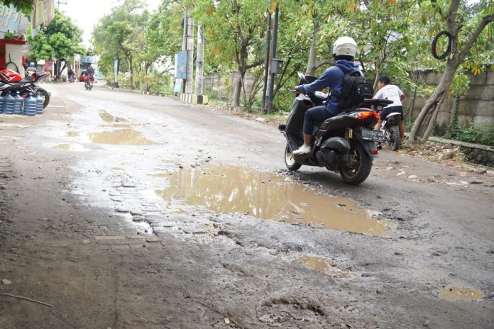 Kondisi jalan Suko Masangan Wetan yang mengalami rusak parah dan akan segera d beton oleh Pemkab Sidoarjo/Foto: Istimewa