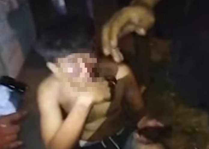 Salah satu anggota gangster yang babak belur dihajar warga / Foto : istimewa