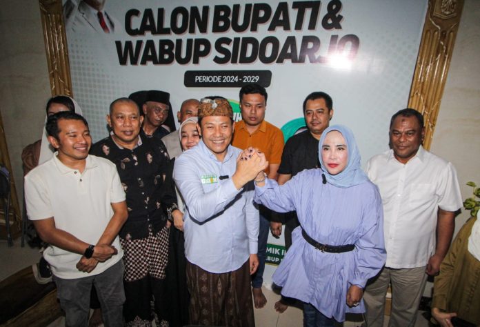 Pasangan BAIK ini mengungguli lawannya, Achmad Amir Aslichin-Edy Widodo, yang hanya mampu meraih 41,96 persen suara./ foto: Ipung Syaiful