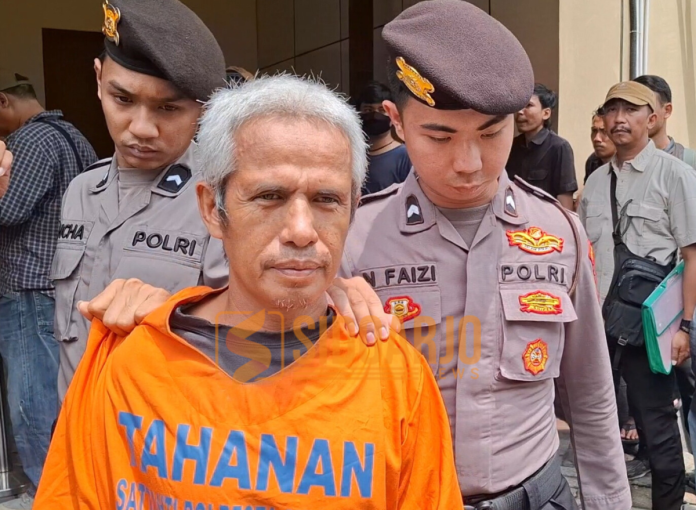 Tampang pelaku predator seksual saat digelandang polisi / Foto (hnf)