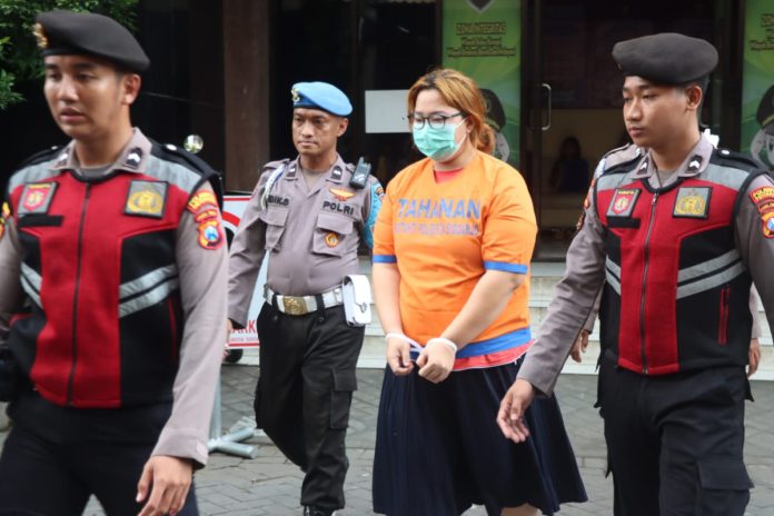 Pelaku penyiram air panas terhadap anaknya/ Foto: istimewa